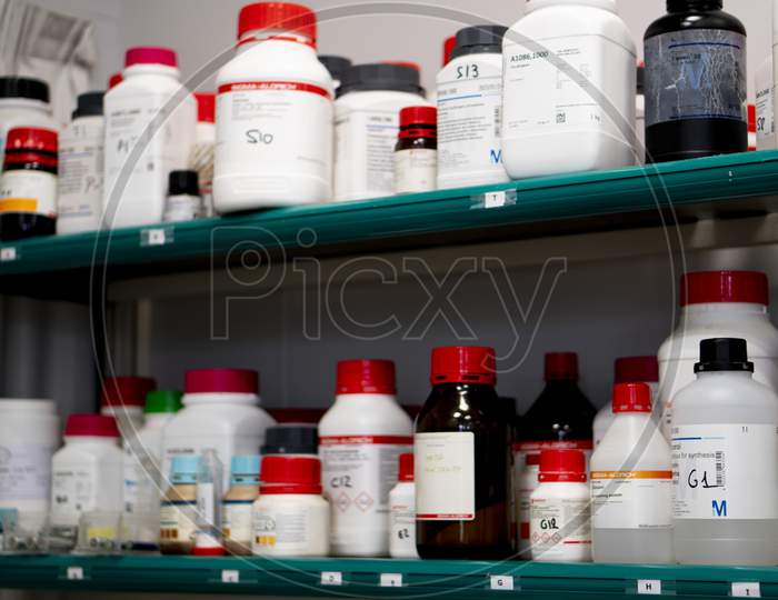 Reagent bottles in research lab.