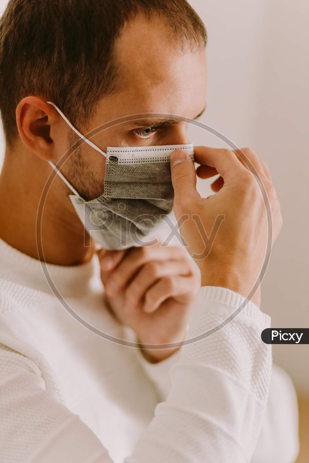 Man Wearing Face Mask For Virus Prevention