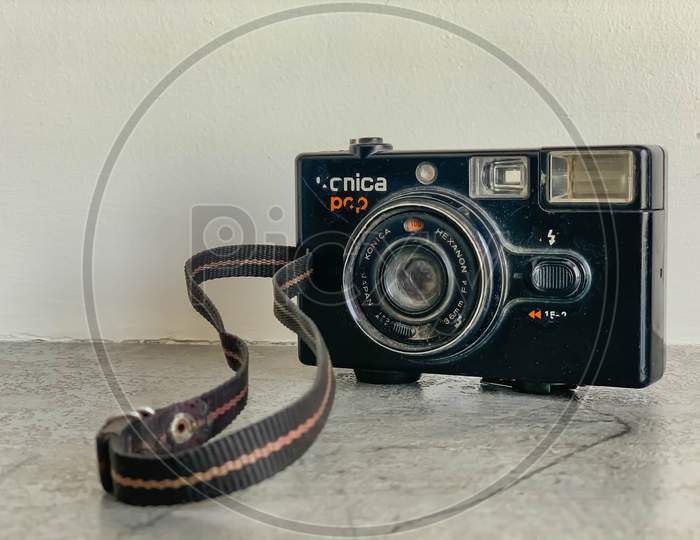 Vintage Konica pop photography camera.