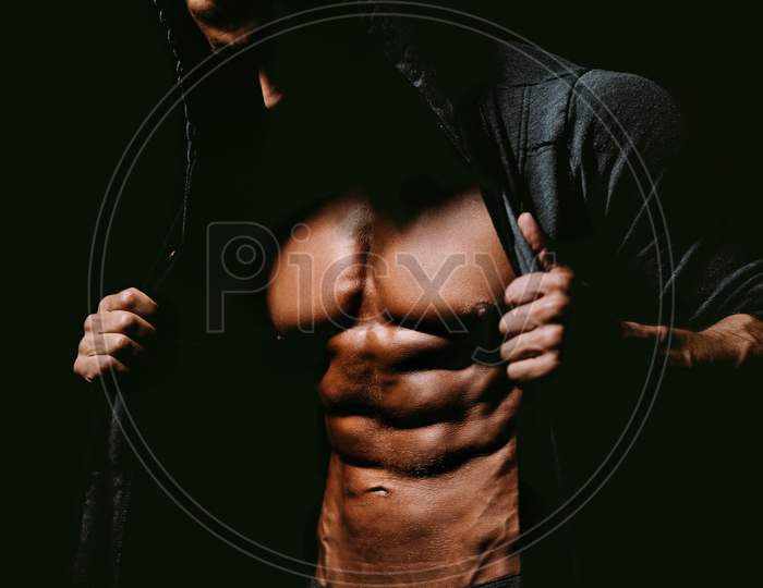 Strong Athletic Man Fitness Showing Abs