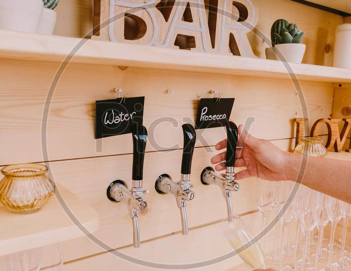 Summer Bar With Lemonade And Prosecco With Wooden Background