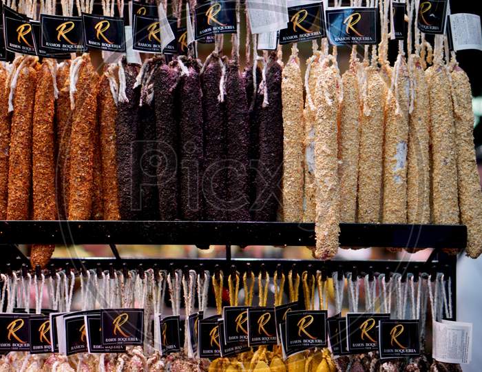 Fancy display of meat to be sold at the La Boqueria Market in Barcelona, Spain.