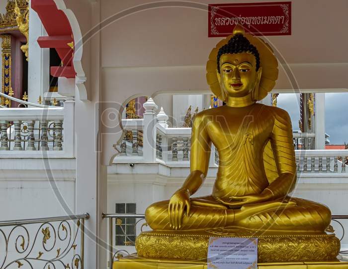 Pattaya,Thailand - April 17,2018: South Pattaya Road This Is A Golden Statue,Which Presents Buddha.The Statue Is In Front Of A Wat.