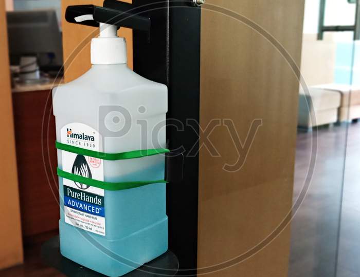 Himalaya brand Hand sanitizer kept in front of office for customers to sanitize their hands.