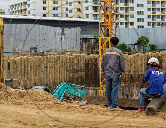Pattaya,Thailand - October 19,2019:Third Road This Big Construction Site Is Opposite The Garden City Tower.Two Thai Men Were Watching The Progress Of The Work.