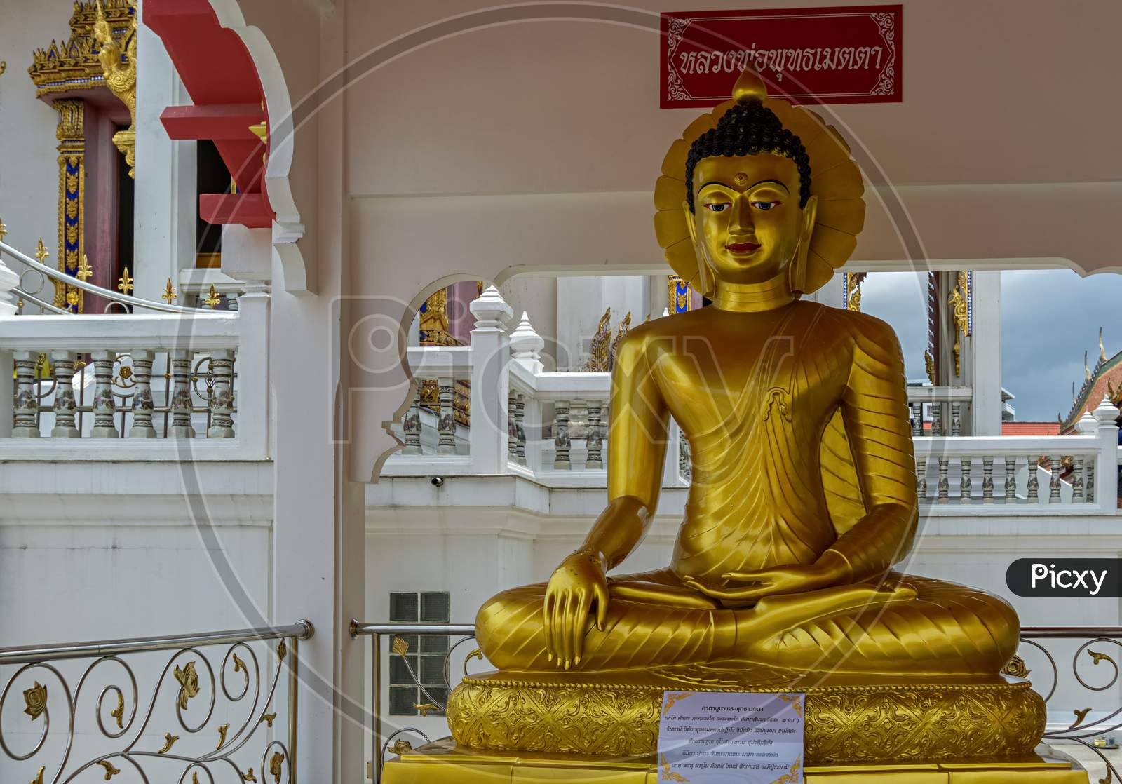 Pattaya,Thailand - April 17,2018: South Pattaya Road This Is A Golden Statue,Which Presents Buddha.The Statue Is In Front Of A Wat.