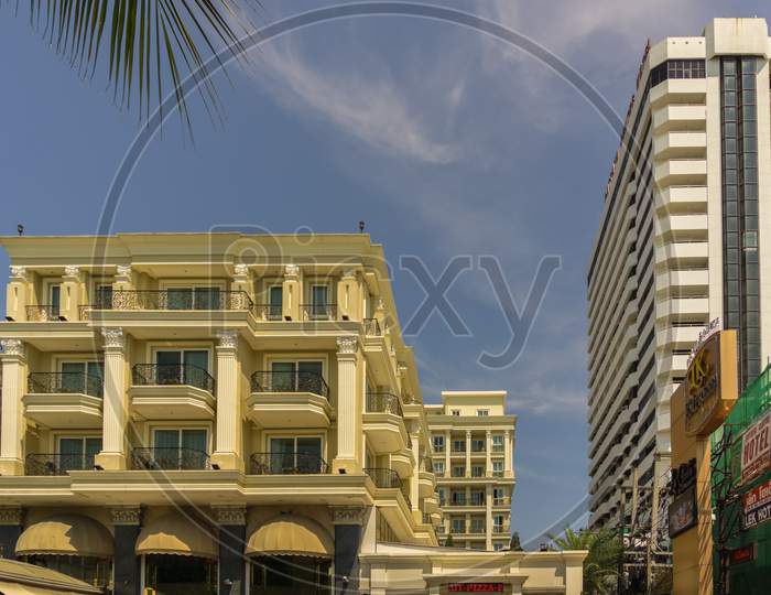 Pattaya,Thailand - April 24,2018: Beachroad These Two Buildings Are The Lk The Empress Hotel(Right) And The Model City Hotel(Left) And Restaurant.