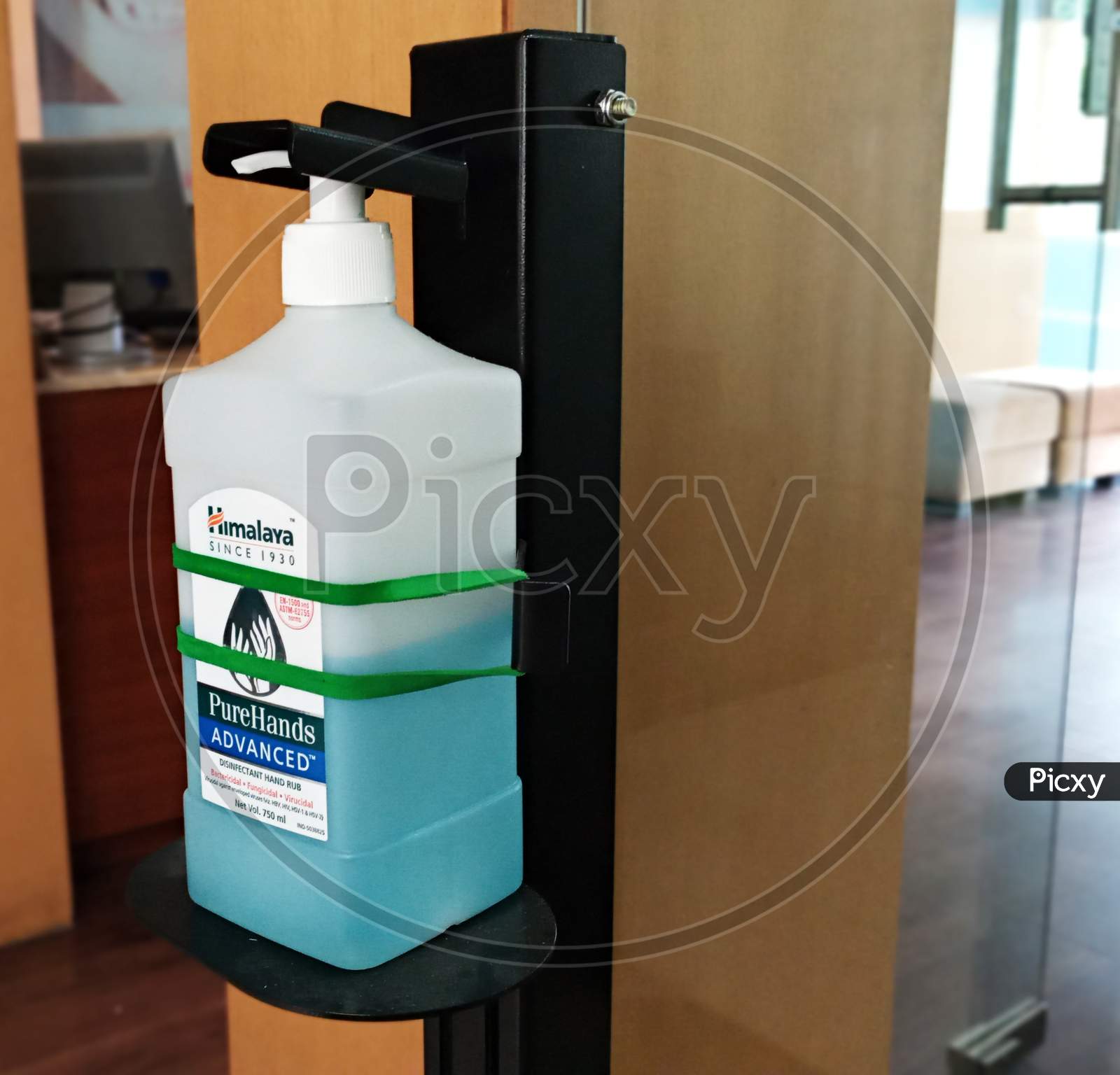 Himalaya brand Hand sanitizer kept in front of office for customers to sanitize their hands.