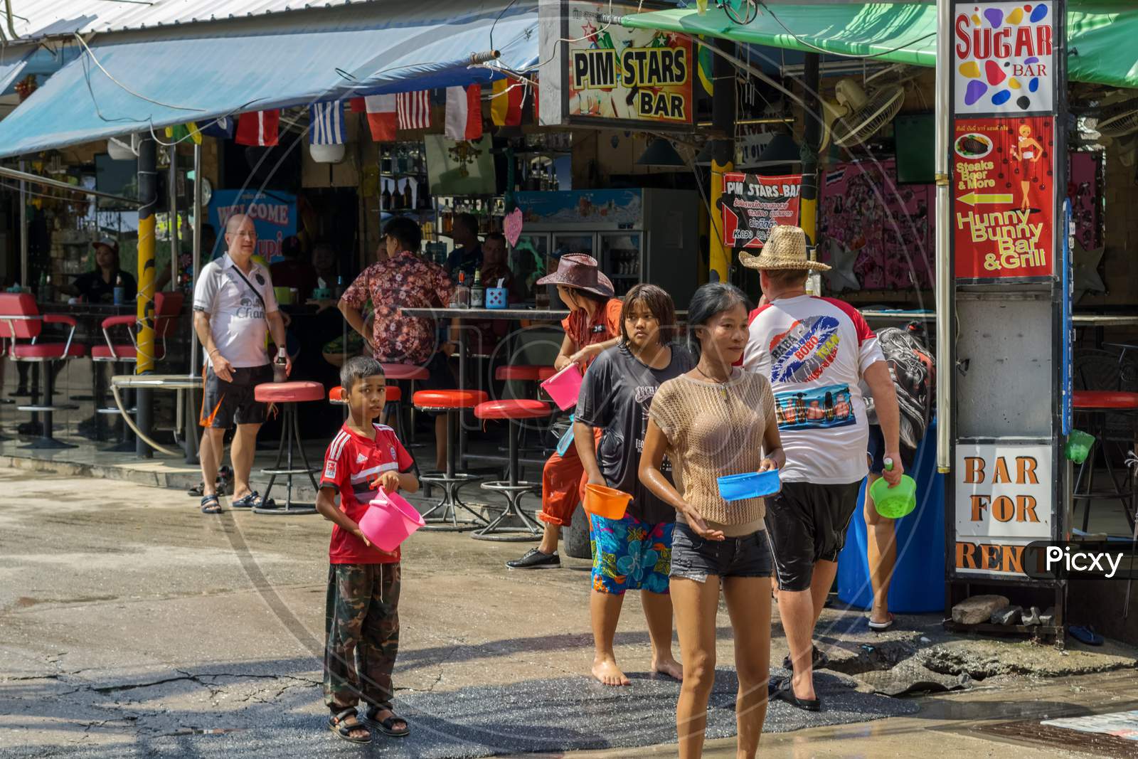 Pattaya,Thailand - April 15,2018: Soi Buakhaow People Were Celebrating Songkran In Front Of A Bar With Water Games.Songkran Is The New Years Eve Of The Country.