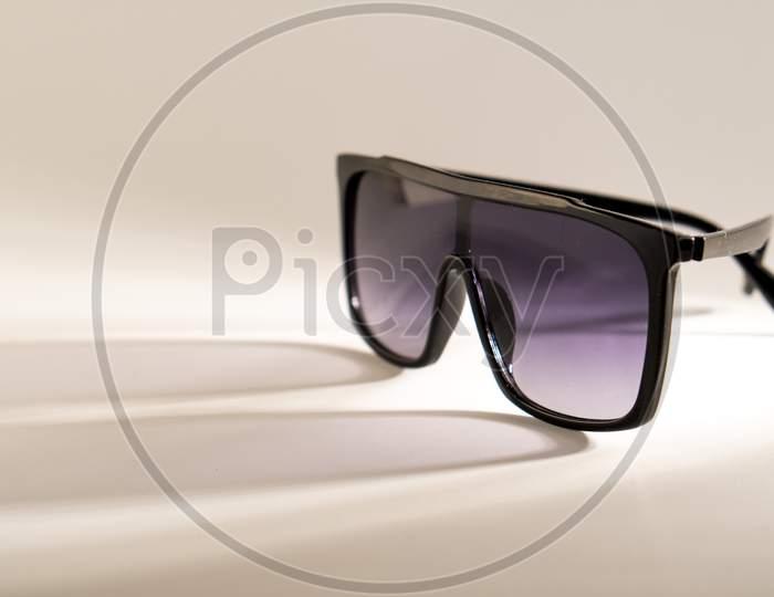 Shaded sunglass on a white background