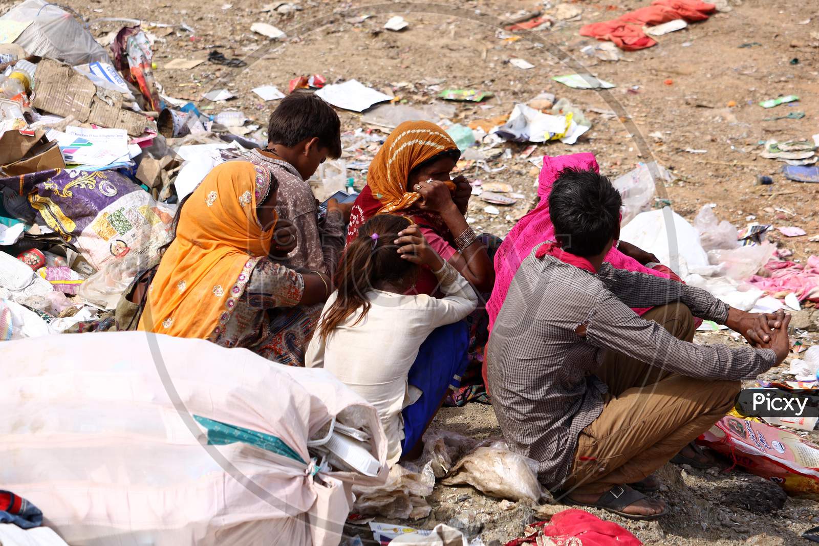 Indian Rag-Pickers Look For Recyclable Material At A Municipal Waste Dumping Site On The Eve Of World Environment Day In Ajmer, Rajasthan, India On 04 May 2020.