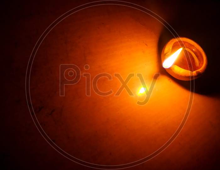 Diya | clay diya oil flame lamp in diwali