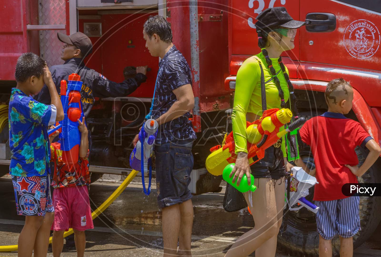 Pattaya,Thailand - April 19,2019:Beachroad Young And Old People Were Celebrating The Last Day Of Songkran With Water Games.