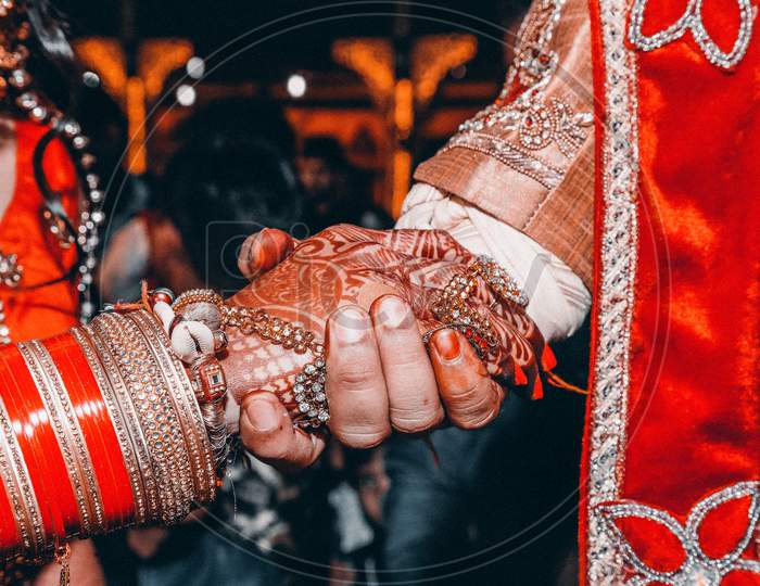 Close Up Of Indian Couple'S Hands At A Wedding