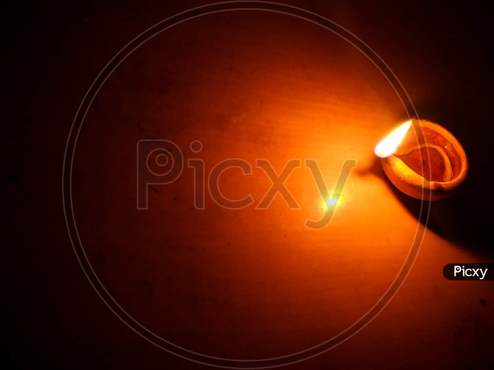 Diya | clay diya oil flame lamp in diwali