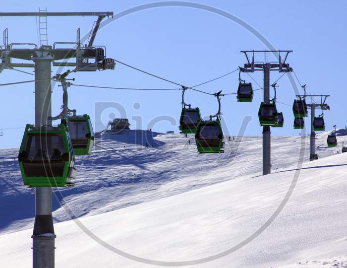 Green Cable Cars In Transalpina Ski Resort