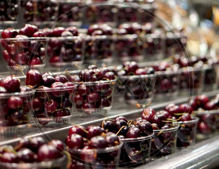 A beautiful shot cherries at La Boqueria market in Barcelona, Spain.
