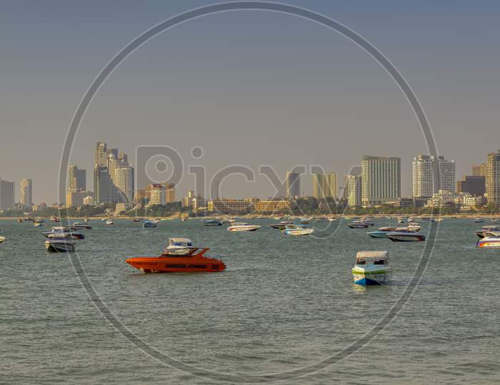 Pattaya,Thailand - April 13,2018: The Beach There Are Many Boats Which You Can Rent For Trips To The Islands.Pattaya Is A Fun Hot Spot Among Adult Tourists From All Over The World.