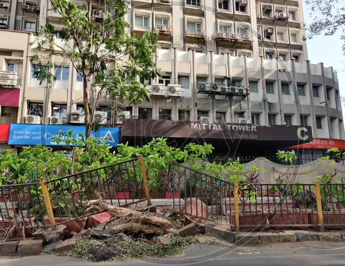 A view shows an uprooted pavement railing, after cyclone Nisarga made its landfall on June 3, on the outskirts of the city, in Mumbai, India, June 5, 2020.