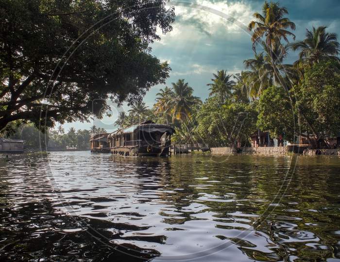 A Scenic View Of House Boats In Backwaters Situated In Allepey Town Located In Kerala State
