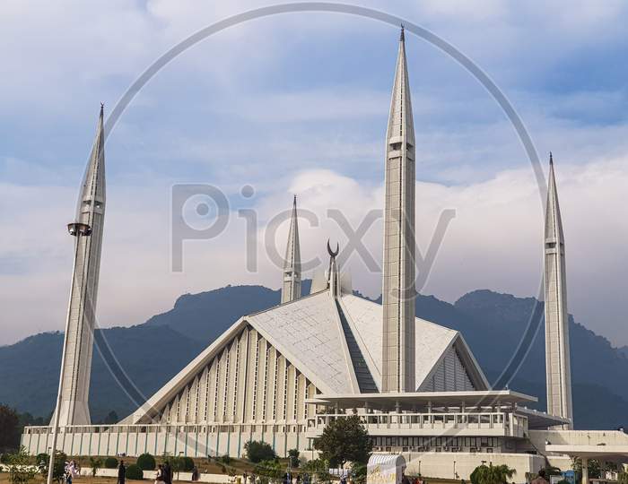 Shah Faisal Mosque Masjid During Sunny And Cloudy Day Islamabad
