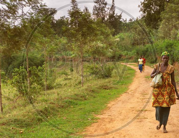 Masaka,Rwanda - October 21,2017:A Path Outside A Young African Woman Was Walking Home From Her Working Place.