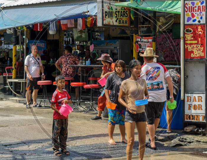 Pattaya,Thailand - April 15,2018: Soi Buakhaow People Were Celebrating Songkran In Front Of A Bar With Water Games.Songkran Is The New Years Eve Of The Country.