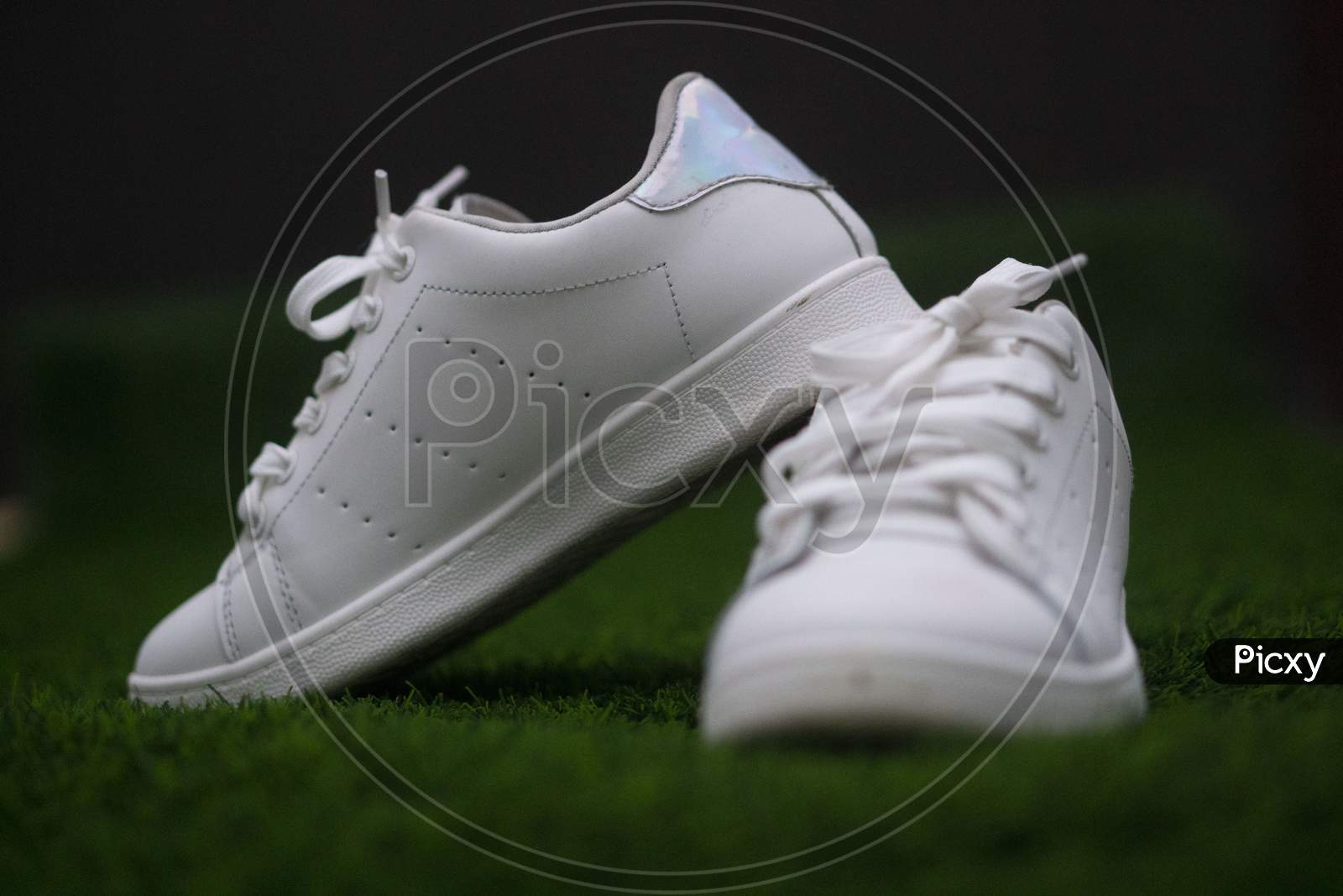 white shoes on the grass