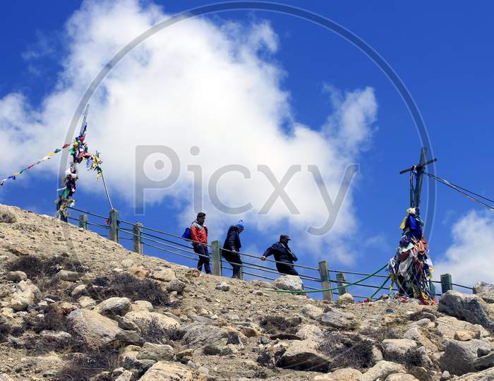 People climbing Steps near Gurudongmar Lake. The highest lakes in the world and in India