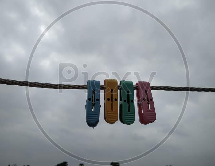 Close Up Of Some Cloth Hanging Clips Stock Photo.This Photos Is Taken In India By Vishal Singh
