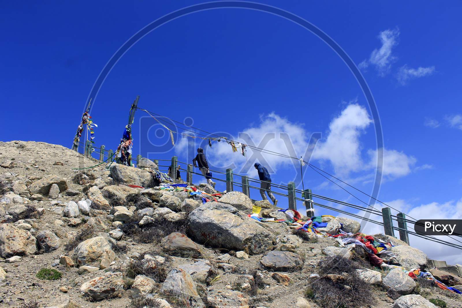 People climbing Steps near Gurudongmar Lake. The highest lakes in the world and in India