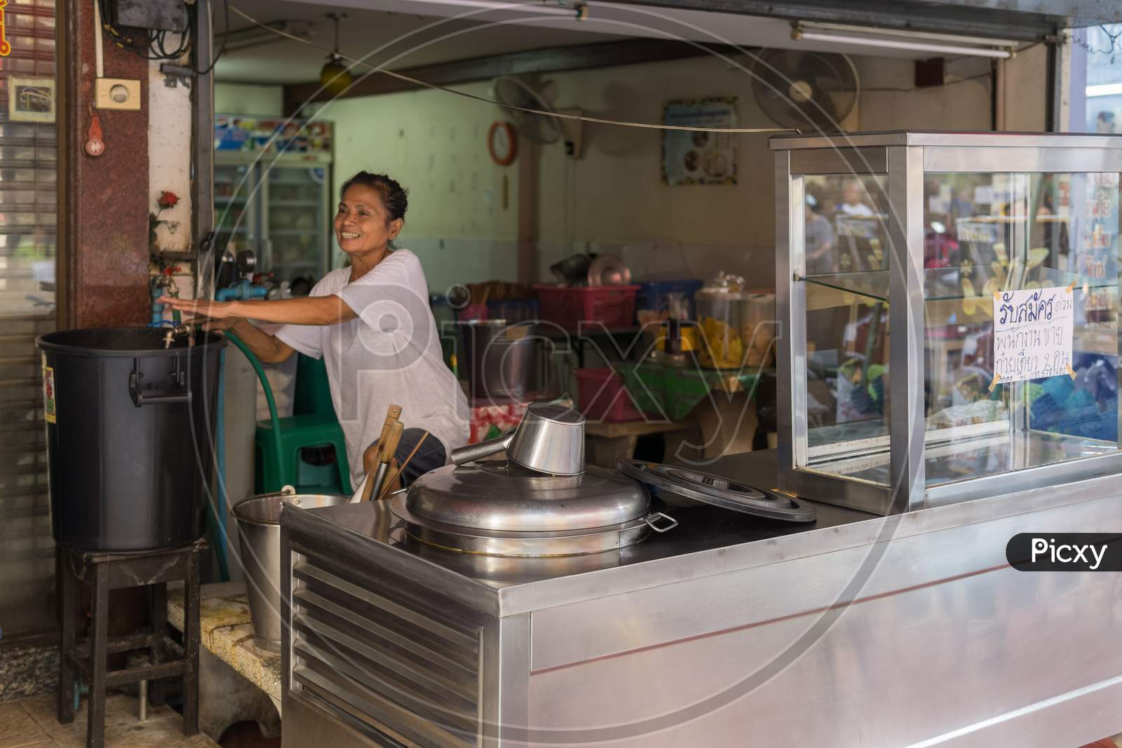 Pattaya,Thailand - October 22,2018:Soi Buakhaow A Thai Woman Is Preparing Her Food Stall For Cooking And Customers.