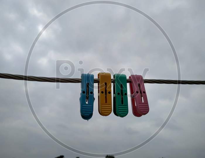 Close Up Of Some Cloth Hanging Clips Stock Photo.This Photos Is Taken In India By Vishal Singh
