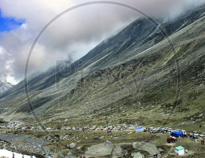 Huge Mountains of Sikkim with Vehicles in the foreground