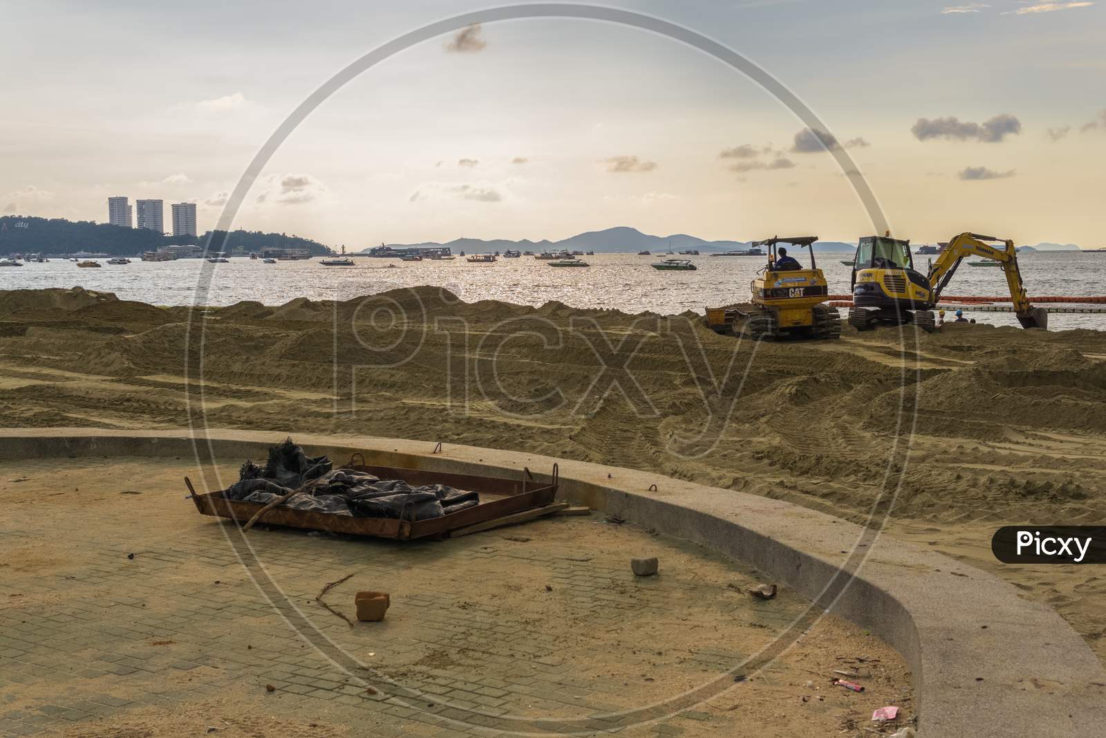 Pattaya,Thailand - October 16,2018: The Beach Thai Workers Enlarged The Beach Through Filling It Up With New Sand.