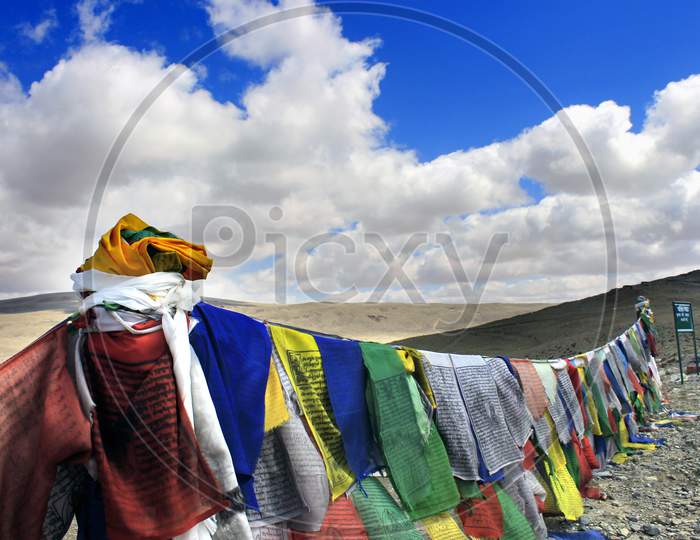 Tibetan prayer flags with Mountains on the Background