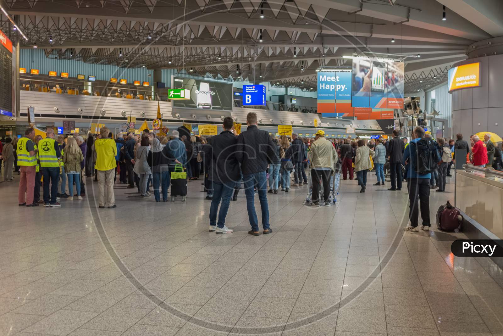 Frankfurt,Germany - April 08,2019:Airport In Terminal 1 A Small Group Of People Were Demonstrating Against The Avaiation Noise From The Airport Area.