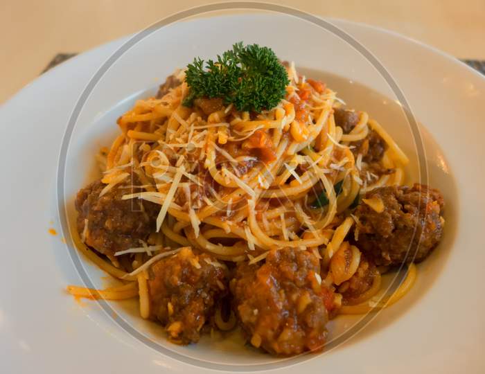 Spaghetti With Meat Balls On A Plate