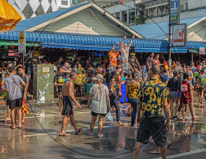 Pattaya,Thailand - April 13,2018: Beach Road People Celebrated Songkran On The Street,Wich Was Partly Closed For Traffic.Songkran Is The New Years Eve Of The Country.