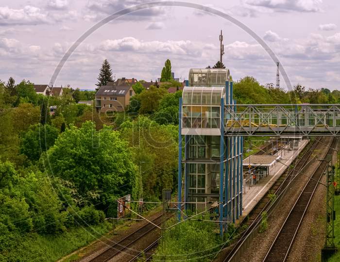 Stuttgart,Germany - April 03,2020:Oesterfeld This Is A Small Train Station Near The Border To Vaihingen..The Bridge Leads To A Business Complex.