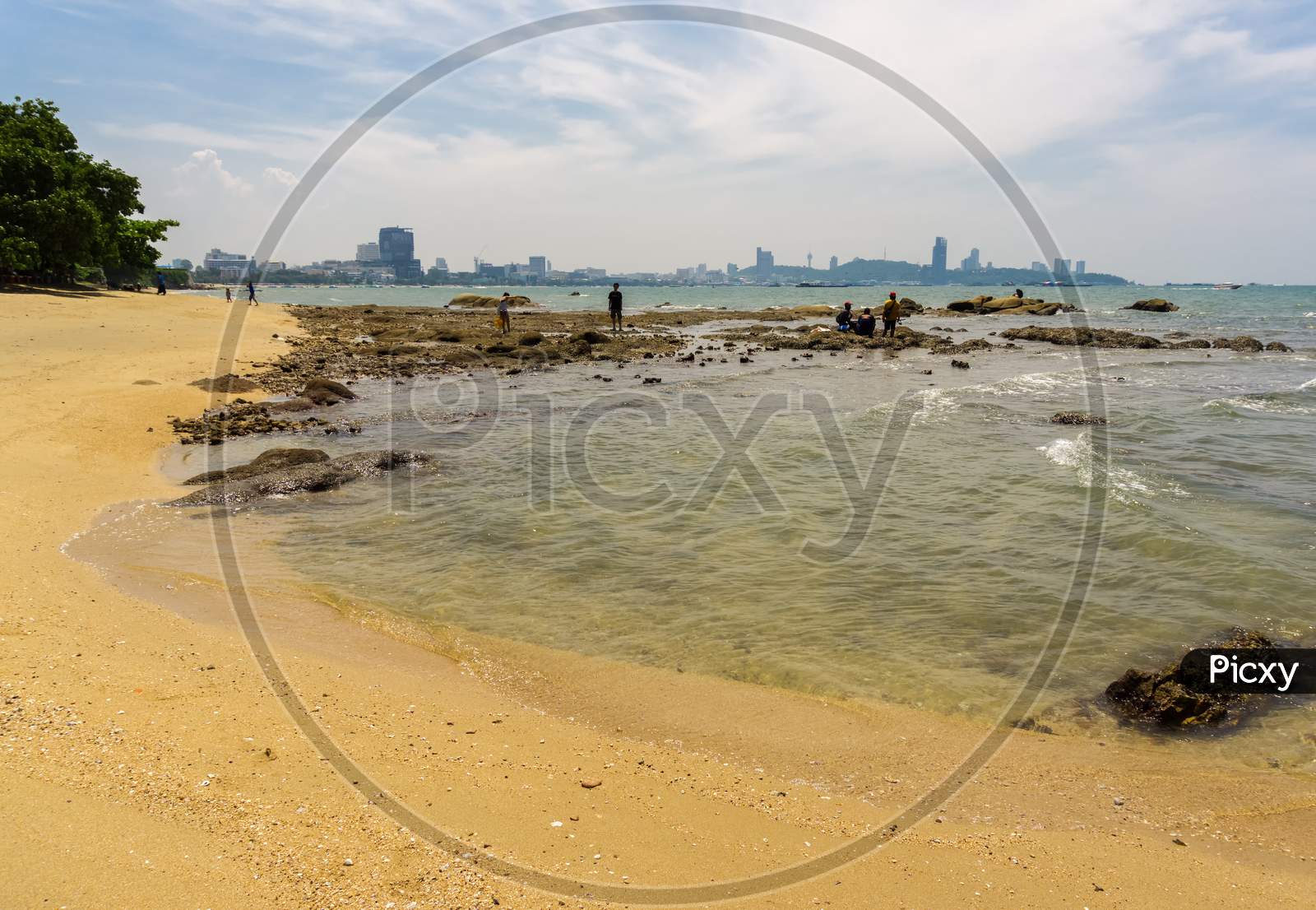 Pattaya,Thailand - October 13,2018: Coral Beach This Is A Small Beach With Many Rocks And Stones And With A View To The City.