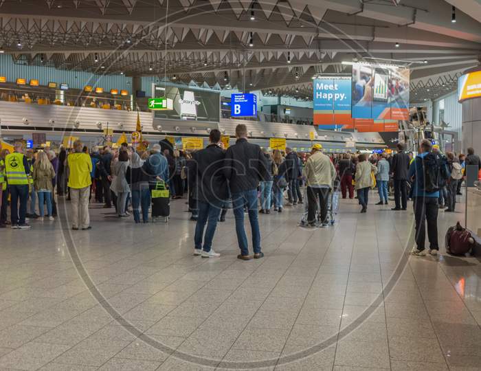 Frankfurt,Germany - April 08,2019:Airport In Terminal 1 A Small Group Of People Were Demonstrating Against The Avaiation Noise From The Airport Area.
