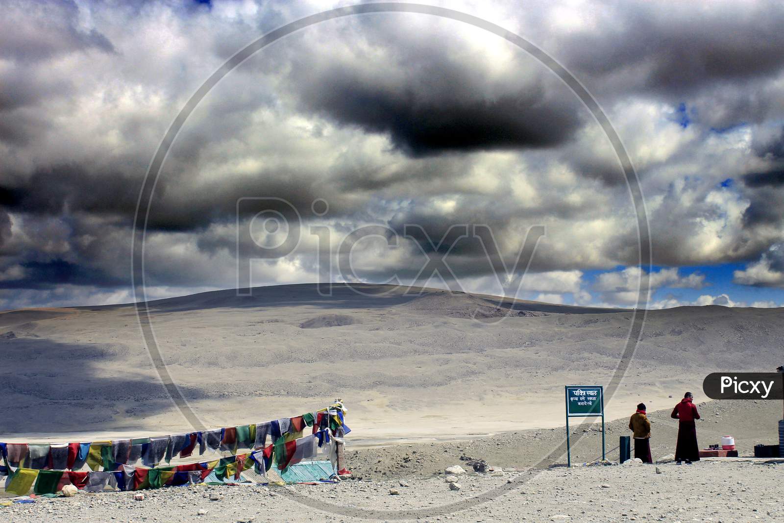 Mountains of Sikkim with Huge Clouds and People in the foreground