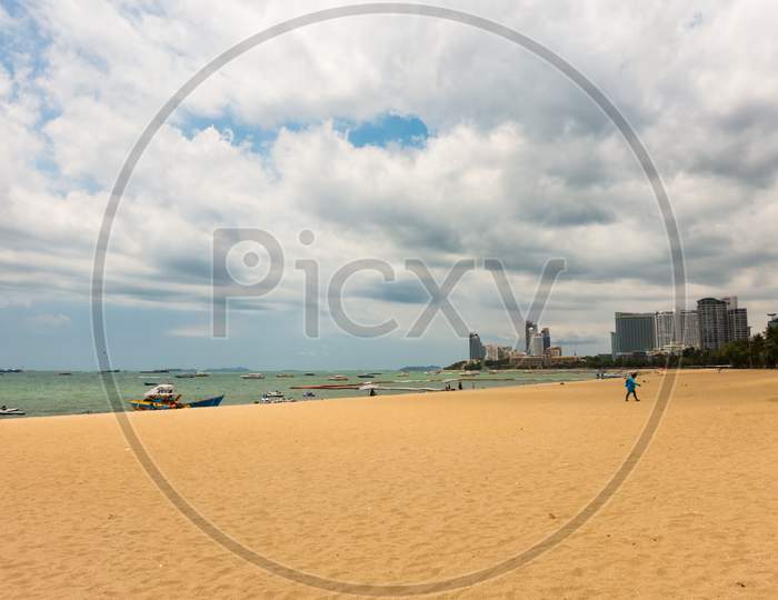 Pattaya,Thailand - April 29,2019:The Beach This Is The Beach Of The City On A Cloudy Day.It Is A Popular Meeting Point For Many Tourists.