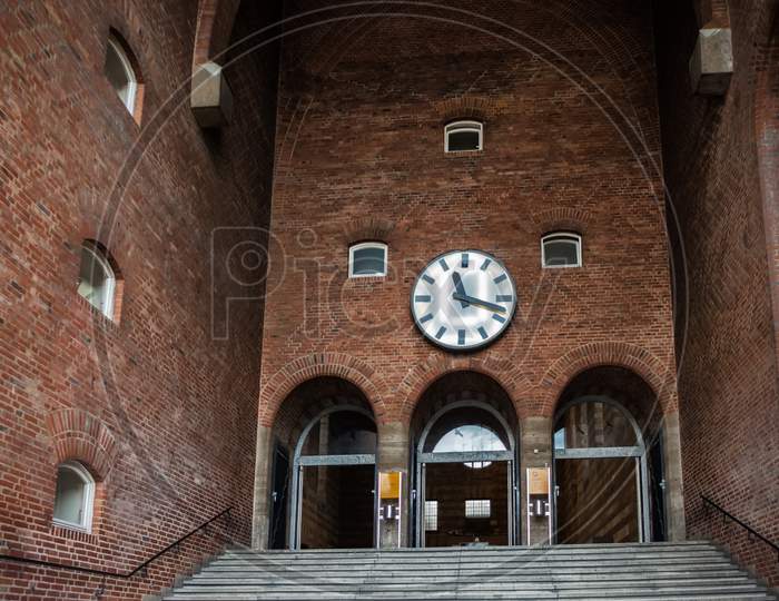 An Old Train Station With A Dirty Clock