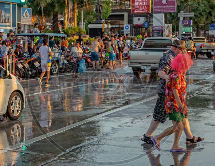 Pattaya,Thailand - April 18,2018: Beachroad People Celebrate Songkran With Water Pistols And Masks.Songkran Is The New Years Eve Of The Country.