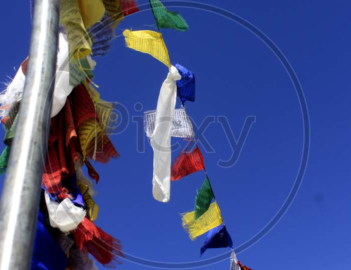 Tibetan prayer flags with Blue Sky in the Background