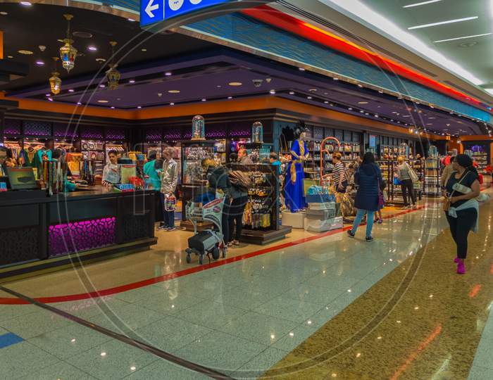 Dubai,The United Arab Emirates - October 11,2018: The Airport This Is The Duty Free Area Of Terminal 3.You Can Buy There Things Like Perfume,Souvenirs,Alcoholic Drinks And Toys.