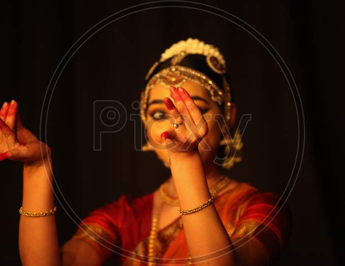 A young bharatnatyam dancer looks at Balrama at the Manamohana event on December 6,2018 at Sevasadan hall in Bengaluru,India  J