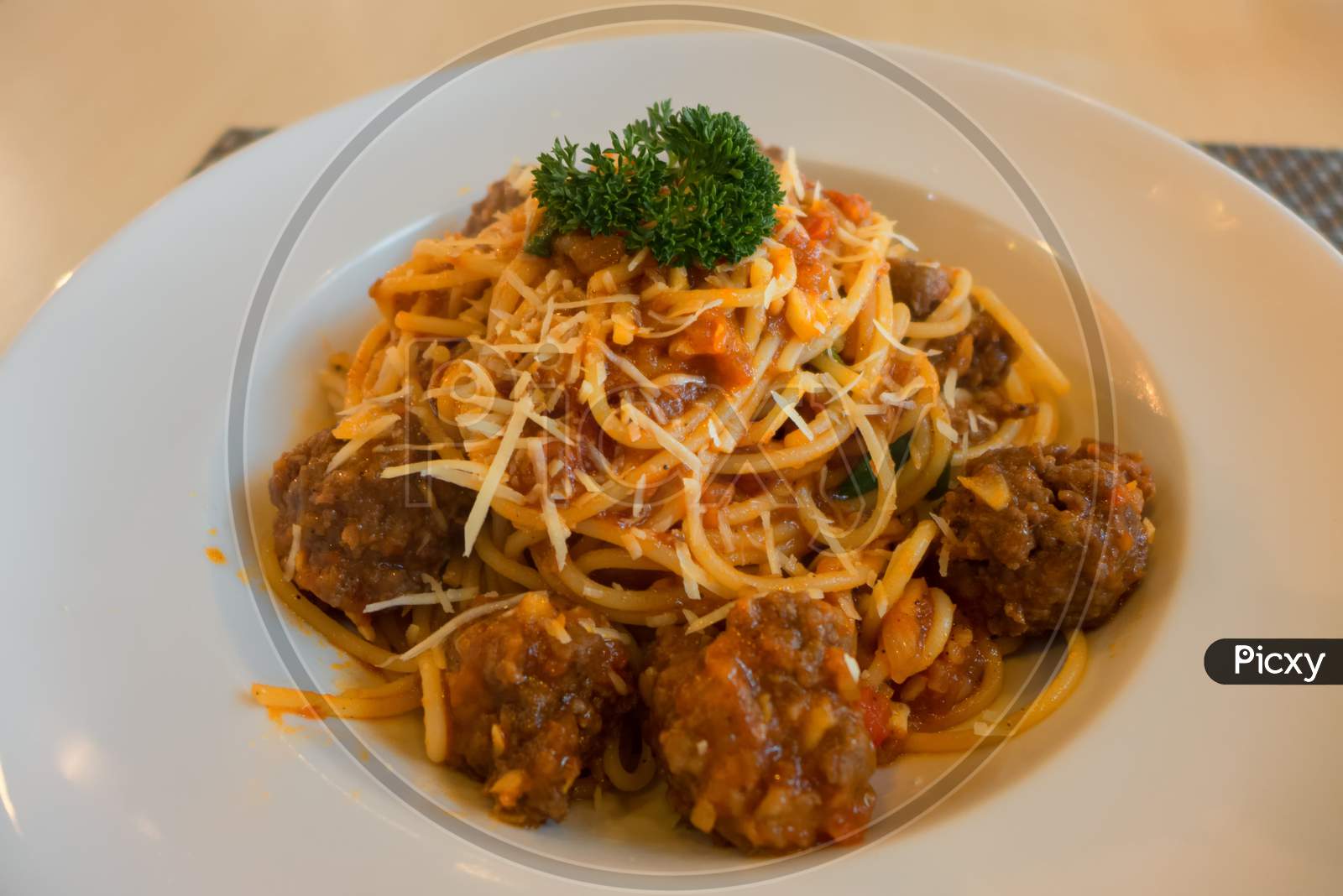 Spaghetti With Meat Balls On A Plate